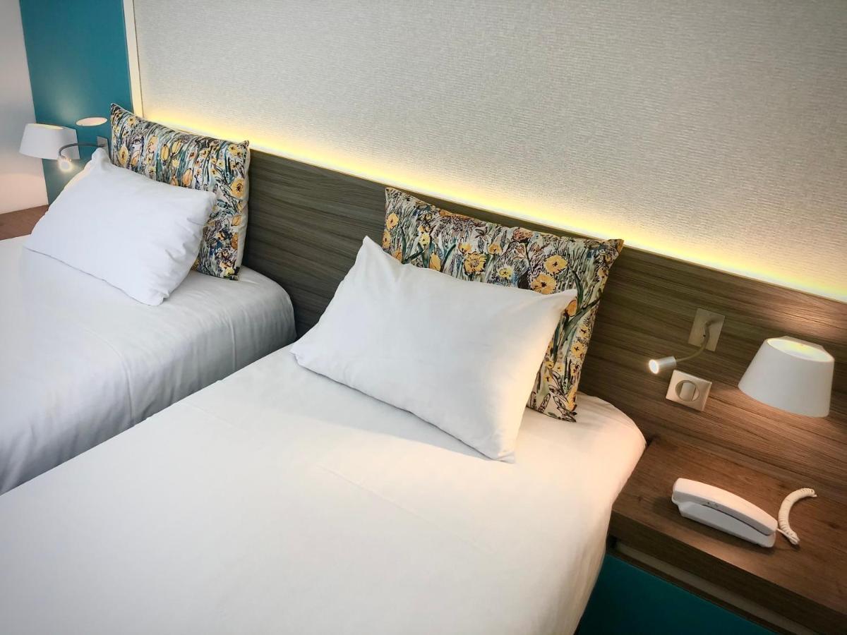 Logis Hotel & Restaurant Les Mouettes - Larmor Plage, Proche De Lorient Екстер'єр фото